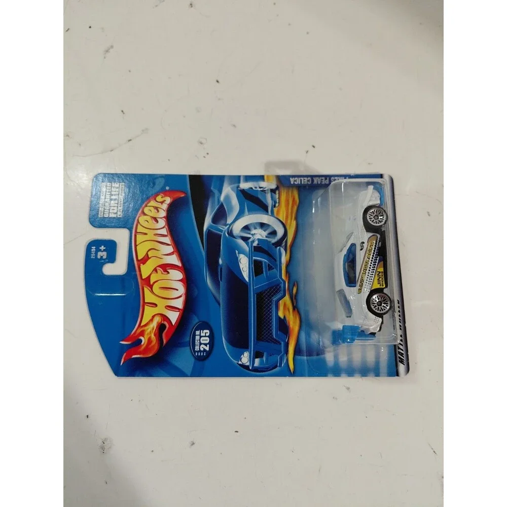 NIP Hot Wheels 2000 Main Line 1:64 DieCast Toyota Celica Pike Peak Hillclimb Car